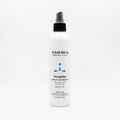Mantra Versatility Leave-In Conditioner in a white spray bottle with black pump nozzle, white background