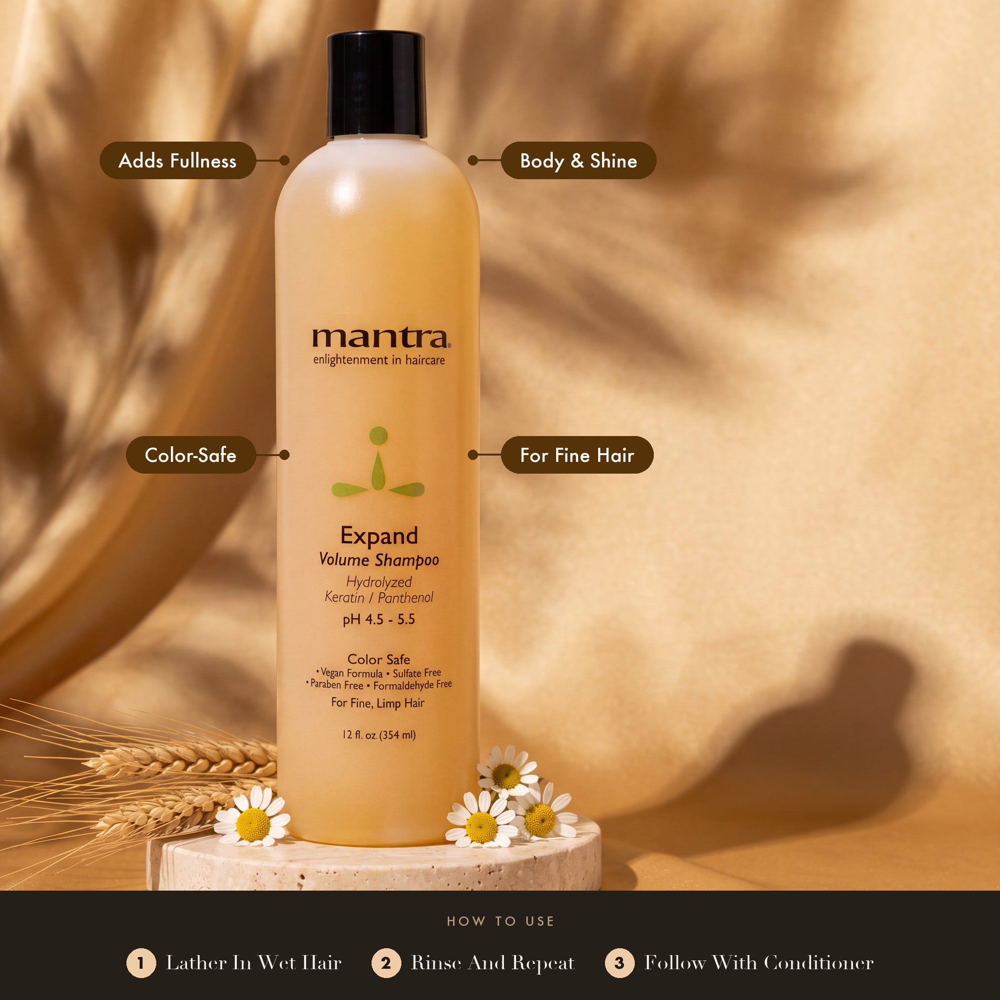 Mantra Expand Volume Shampoo on travertine with wheat and chamomile: adds fullness, body and shine, color-safe, for fine hair. How to use: lather in wet hair, rinse and repeat, follow with conditioner